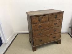 A 19th Century oak chest, the two plank top with applied moulded edge,