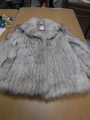 A Norwegian blue fox fur coat with sateen lining,