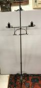A wrought iron candle stand in the 17th Century manner,