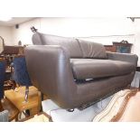 A Habitat brown leather upholstered two seat sofa,