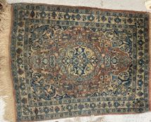 A vintage Kashan rug,