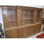A 20th Century oak breakfront dresser in the Arts & Crafts manner,