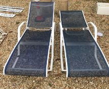 A pair of modern painted metal sun loungers CONDITION REPORTS There is a slight
