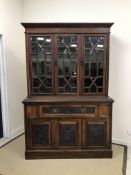 A Victorian walnut bookcase cabinet,