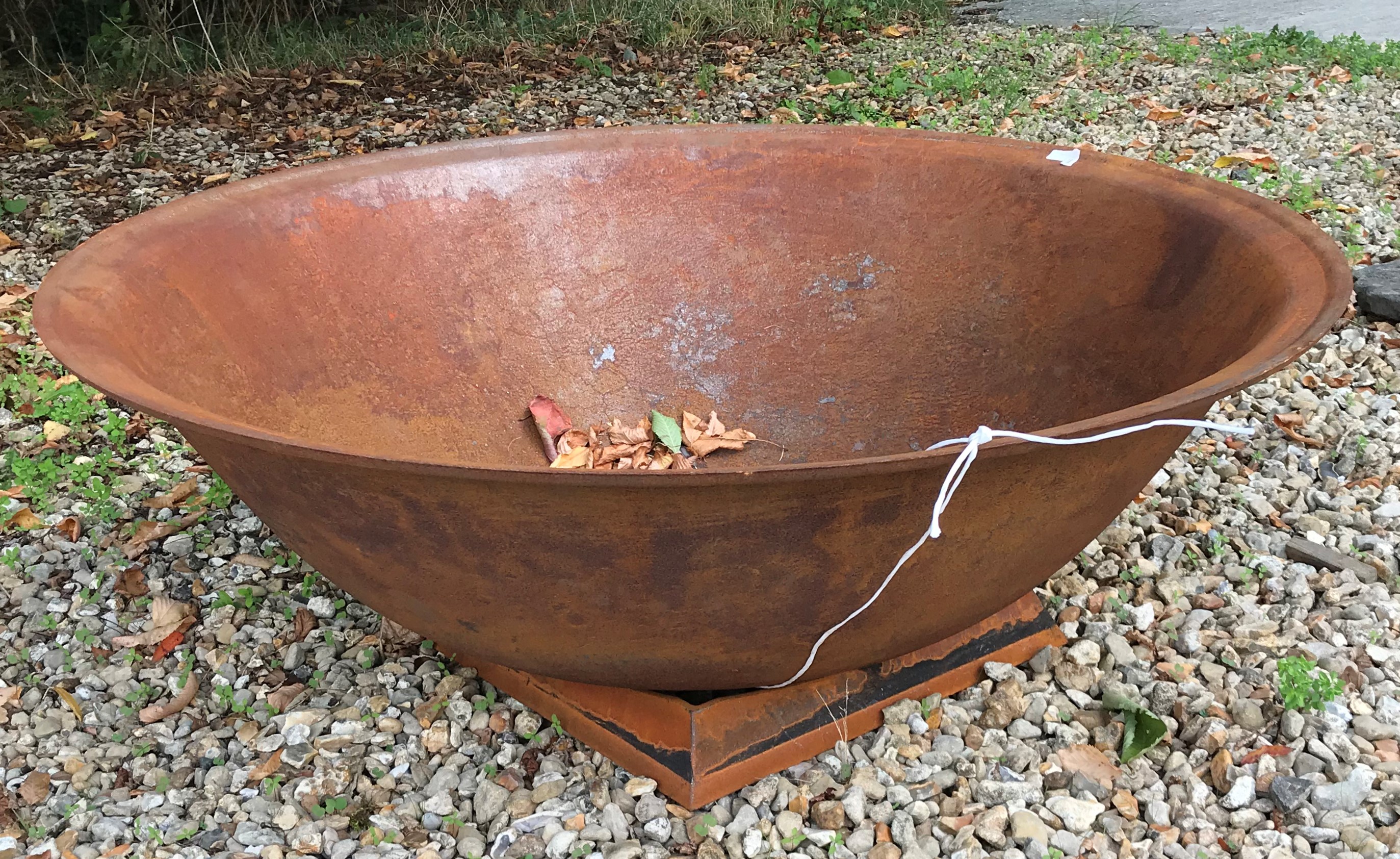 A cast iron fire pit with rust patination, - Image 3 of 3