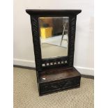 A 19th Century oak hall mirror in the 17th Century style,