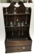 An 18th Century oak spoon rack,