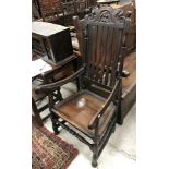 A circa 1700 style oak hall chair,