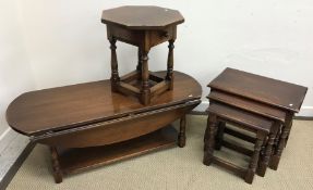 A modern oak nest of three occasional tables in the 17th Century style 55 cm x 35 cm x 47.