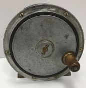 An alloy and ebonite 4½" salmon fly reel
