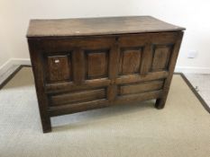A 19th Century oak coffer, the plank top
