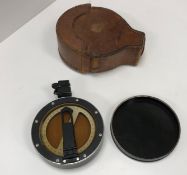 A vintage Prismatic compass with heavy l