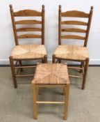 A pine side cabinet, the plain top above