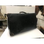 A Revelation black stained suitcase with