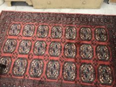 A modern Frith Rugs Bokhara rug, the cen