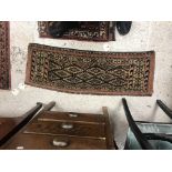 A Torba rug, the central panel set with