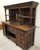 A late Victorian aesthetic oak sideboard