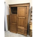 A modern pine wardrobe with two cupboard