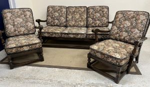 An Ercol elm framed three piece cottage