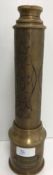 A reproduction brass three draw telescop