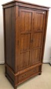 A modern cherry wood veneered wardrobe w