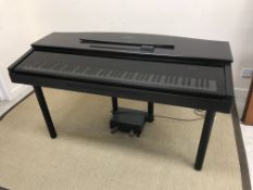 A Yamaha Clavinova CVP-10 with associated stool CONDITION REPORTS Appears to be in