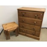 A modern pine chest of four long drawers