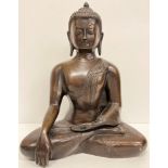 A modern bronze figure of the Shakyamuni