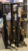 A collection of 12 black painted metal board rigging sections, stencilled "Dove Part No.