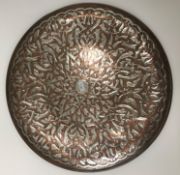 A Middle Eastern Islamic copper and whit