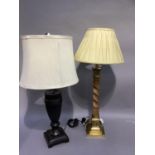 A gilt metal and teak column lamp on square stepped base, approximately 60cm to fitting together