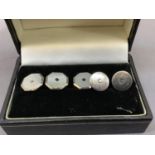 An Art Deco set of dress collar and shirt studs and buttons in silver set with octagonal mother of