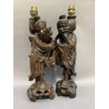 Two Chinese root carvings of a fisherman and a farmer converted to table lamps, approximately 41cm