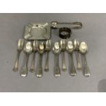 A set of five silver teaspoons initialled together with five silver cake forks, a pair of sugar