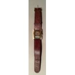 A gentleman's Tissot wristwatch with burgundy leather strap together with a Trafalgar crystal