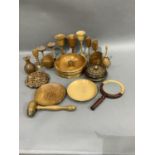 A selection of treen including goblets of various sizes, egg cup, nut bowl and crack, lidded dish,