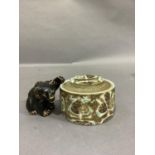 A Royal Copenhagen faience lidded dish and a model of a bear with brown glaze