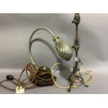 An early 20th century coppered metal reading lamp with adjustable arm together with a Bakolite and