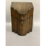 A George III figured mahogany knife box inlaid with boxwood and ebony chequered stringing, the