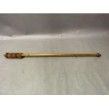 A Victorian mahogany stained curtain pole with rrings and acorn finials