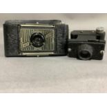 An Ensign midget camera, model 22 in leather case measuring 9cm wide by 4cm high together with a