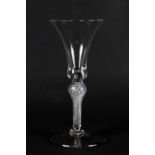 A MID 18TH CENTURY WINE GLASS with bell bowl with a shoulder knop and air twist stem and on