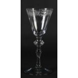 A MID 18TH CENTURY DUTCH ENGRAVED WINE GLASS c.1750, the rounded funnel bowl engraved to the rim