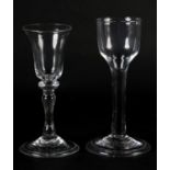 A MID 18TH CENTURY WINE GLASS with ogee bowl, on a plain stem and folded conical foot, 14.5cm and