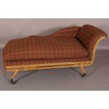 AN EARLY 20TH CENTURY DAY BED, on a gilt metal frame with castors, upholstered in brown, aubergine