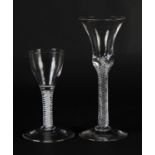 A MID 18TH CENTURY WINE GLASS, the drawn bell bowl on a single series air twist stem and conical