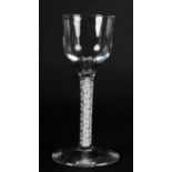 A MID 18TH CENTURY WINE GLASS with ogee bowl on a double series opaque twist stem and conical