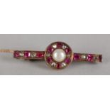 A VICTORIAN PEARL, RUBY AND DIAMOND BAR BROOCH IN 9CT GOLD, the blister pearl rose cut diamonds