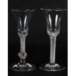 A MID 18TH CENTURY WINE GLASS with bell bowl on an airtwist stem with basal knop, on folded