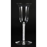 A WINE GLASS with drawn bell bowl on a slender airtwist stem and conical foot, 15.75cm